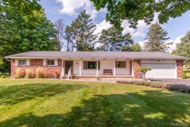 Welcome to your dream home! This stunning move-in ready on Corunna Hills Golf Course in Michigan - for sale on GolfHomes.com, golf home, golf lot