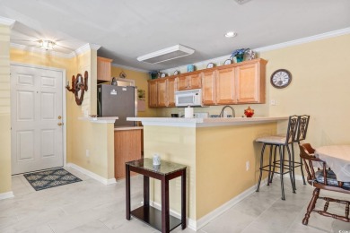 Step into this beautifully maintained, spacious first-floor on Wachesaw Plantation East Golf Course in South Carolina - for sale on GolfHomes.com, golf home, golf lot
