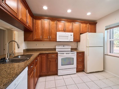 Stunning golf & lake views over Hole 4 of the West Course set on Old Marsh Golf Club in Florida - for sale on GolfHomes.com, golf home, golf lot