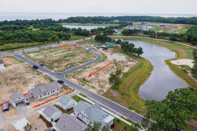 This beautiful golf and water view homesite is located in the on Bay Creek Golf Club in Virginia - for sale on GolfHomes.com, golf home, golf lot