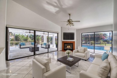 This extremely bright and expansive lakefront home in Greenview on Greenview Cove Golf Club in Florida - for sale on GolfHomes.com, golf home, golf lot