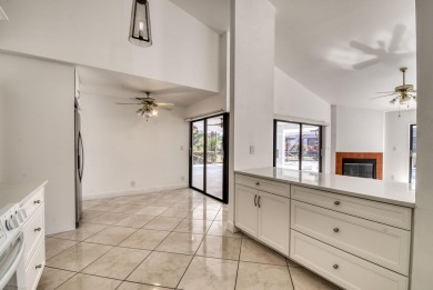 This extremely bright and expansive lakefront home in Greenview on Greenview Cove Golf Club in Florida - for sale on GolfHomes.com, golf home, golf lot