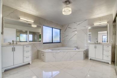 This extremely bright and expansive lakefront home in Greenview on Greenview Cove Golf Club in Florida - for sale on GolfHomes.com, golf home, golf lot