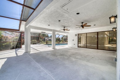 This extremely bright and expansive lakefront home in Greenview on Greenview Cove Golf Club in Florida - for sale on GolfHomes.com, golf home, golf lot
