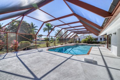This extremely bright and expansive lakefront home in Greenview on Greenview Cove Golf Club in Florida - for sale on GolfHomes.com, golf home, golf lot