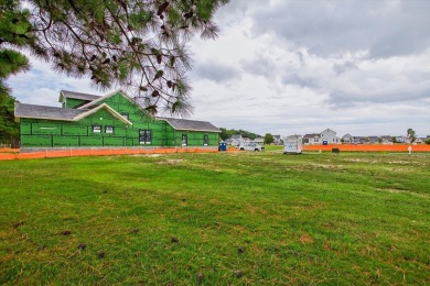 This beautiful golf and water view homesite is located in the on Bay Creek Golf Club in Virginia - for sale on GolfHomes.com, golf home, golf lot