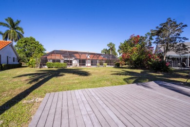 This extremely bright and expansive lakefront home in Greenview on Greenview Cove Golf Club in Florida - for sale on GolfHomes.com, golf home, golf lot