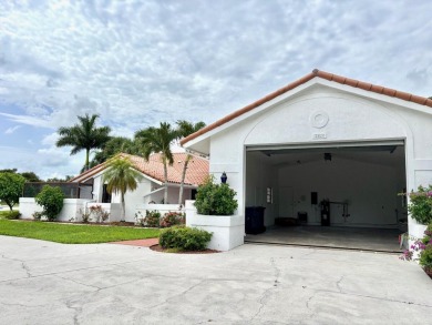This extremely bright and expansive lakefront home in Greenview on Greenview Cove Golf Club in Florida - for sale on GolfHomes.com, golf home, golf lot