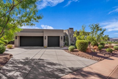 Stunning views and walls of glass bring the red rocks and on Entrada at Snow Canyon in Utah - for sale on GolfHomes.com, golf home, golf lot