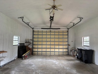 This extremely bright and expansive lakefront home in Greenview on Greenview Cove Golf Club in Florida - for sale on GolfHomes.com, golf home, golf lot