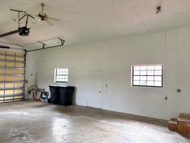This extremely bright and expansive lakefront home in Greenview on Greenview Cove Golf Club in Florida - for sale on GolfHomes.com, golf home, golf lot