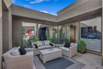 Stunning views and walls of glass bring the red rocks and on Entrada at Snow Canyon in Utah - for sale on GolfHomes.com, golf home, golf lot
