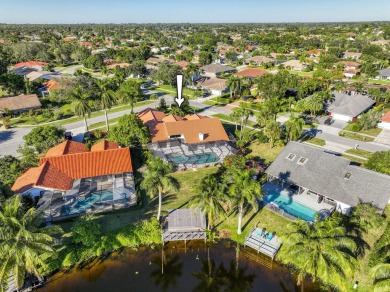 This extremely bright and expansive lakefront home in Greenview on Greenview Cove Golf Club in Florida - for sale on GolfHomes.com, golf home, golf lot