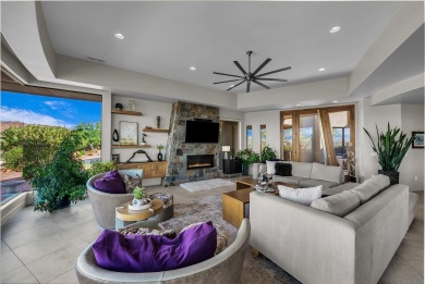 Stunning views and walls of glass bring the red rocks and on Entrada at Snow Canyon in Utah - for sale on GolfHomes.com, golf home, golf lot