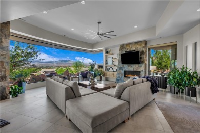 Stunning views and walls of glass bring the red rocks and on Entrada at Snow Canyon in Utah - for sale on GolfHomes.com, golf home, golf lot