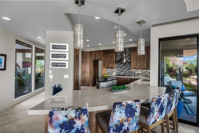 Stunning views and walls of glass bring the red rocks and on Entrada at Snow Canyon in Utah - for sale on GolfHomes.com, golf home, golf lot