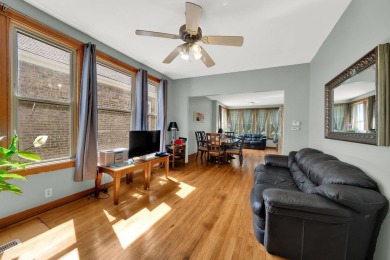 Charming brick bungalow offering 3 bedrooms, 1 full bath, a on Marquette Park Golf Course in Illinois - for sale on GolfHomes.com, golf home, golf lot