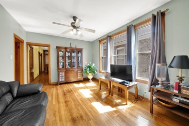 Charming brick bungalow offering 3 bedrooms, 1 full bath, a on Marquette Park Golf Course in Illinois - for sale on GolfHomes.com, golf home, golf lot