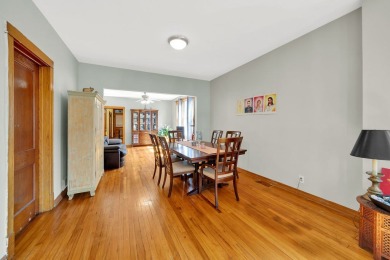 Charming brick bungalow offering 3 bedrooms, 1 full bath, a on Marquette Park Golf Course in Illinois - for sale on GolfHomes.com, golf home, golf lot