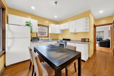 Charming brick bungalow offering 3 bedrooms, 1 full bath, a on Marquette Park Golf Course in Illinois - for sale on GolfHomes.com, golf home, golf lot