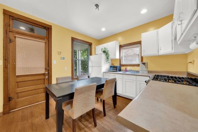 Charming brick bungalow offering 3 bedrooms, 1 full bath, a on Marquette Park Golf Course in Illinois - for sale on GolfHomes.com, golf home, golf lot
