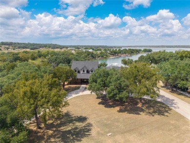 Welcome to your dream getaway! This breathtaking lakefront home on Hideout Golf Club and Resort  in Texas - for sale on GolfHomes.com, golf home, golf lot