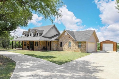 Welcome to your dream getaway! This breathtaking lakefront home on Hideout Golf Club and Resort  in Texas - for sale on GolfHomes.com, golf home, golf lot