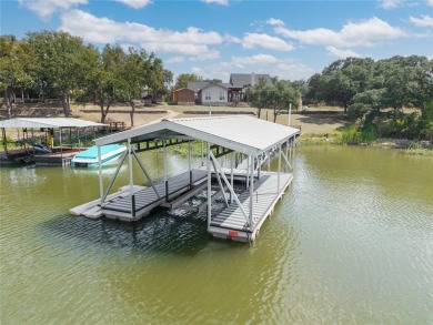 Welcome to your dream getaway! This breathtaking lakefront home on Hideout Golf Club and Resort  in Texas - for sale on GolfHomes.com, golf home, golf lot