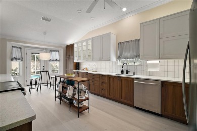BOND PAID! STUNNING 3 BED / 2 BATH DESIGNER HOME WITH SALTWATER on The Links of Spruce Creek in Florida - for sale on GolfHomes.com, golf home, golf lot