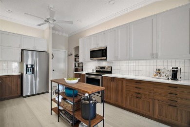 BOND PAID! STUNNING 3 BED / 2 BATH DESIGNER HOME WITH SALTWATER on The Links of Spruce Creek in Florida - for sale on GolfHomes.com, golf home, golf lot