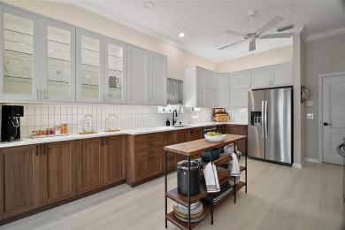 BOND PAID! STUNNING 3 BED / 2 BATH DESIGNER HOME WITH SALTWATER on The Links of Spruce Creek in Florida - for sale on GolfHomes.com, golf home, golf lot