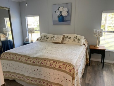Cozy Open Concept mobile home in vibrant 55+ community on leased on Spanish Lakes Fairways in Florida - for sale on GolfHomes.com, golf home, golf lot