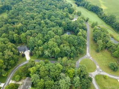 Vacant land in the prestigious Timber Point Estates ready for on The Timbers Golf Club in Michigan - for sale on GolfHomes.com, golf home, golf lot