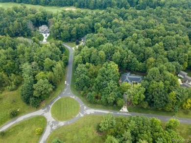 Vacant land in the prestigious Timber Point Estates ready for on The Timbers Golf Club in Michigan - for sale on GolfHomes.com, golf home, golf lot