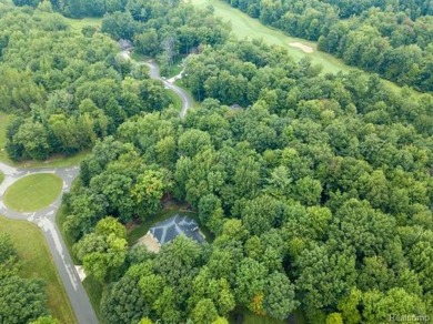 Vacant land in the prestigious Timber Point Estates ready for on The Timbers Golf Club in Michigan - for sale on GolfHomes.com, golf home, golf lot