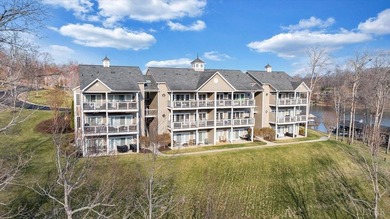 Enjoy effortless lake living in this top-floor 2-bedroom, 2-bath on The Waterfront Country Club in Virginia - for sale on GolfHomes.com, golf home, golf lot