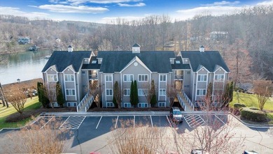 Enjoy effortless lake living in this top-floor 2-bedroom, 2-bath on The Waterfront Country Club in Virginia - for sale on GolfHomes.com, golf home, golf lot