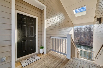 Enjoy effortless lake living in this top-floor 2-bedroom, 2-bath on The Waterfront Country Club in Virginia - for sale on GolfHomes.com, golf home, golf lot