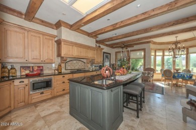 This exceptional 3-bedroom, 3-bath golf course property in on Gainey Ranch Golf Club in Arizona - for sale on GolfHomes.com, golf home, golf lot