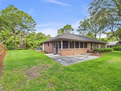 Perfectly positioned on the Rocky Bayou Country Club Golf Course on Rocky Bayou Country Club in Florida - for sale on GolfHomes.com, golf home, golf lot