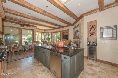 This exceptional 3-bedroom, 3-bath golf course property in on Gainey Ranch Golf Club in Arizona - for sale on GolfHomes.com, golf home, golf lot