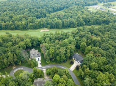 Vacant land in the prestigious Timber Point Estates ready for on The Timbers Golf Club in Michigan - for sale on GolfHomes.com, golf home, golf lot