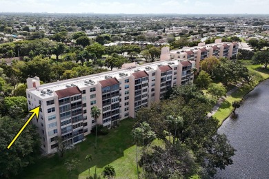 Discover comfort, convenience, and breathtaking views in this on Marina Lakes Golf Course in Florida - for sale on GolfHomes.com, golf home, golf lot