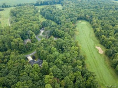 Vacant land in the prestigious Timber Point Estates ready for on The Timbers Golf Club in Michigan - for sale on GolfHomes.com, golf home, golf lot