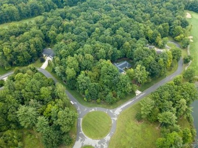 Vacant land in the prestigious Timber Point Estates ready for on The Timbers Golf Club in Michigan - for sale on GolfHomes.com, golf home, golf lot