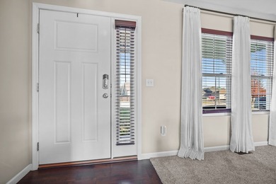 This beautiful home boasts 4 bedrooms and 3.5 baths, with a on Prairie Vista Golf Course in Illinois - for sale on GolfHomes.com, golf home, golf lot