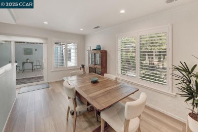 Step into this sophisticated level-in, single row and end unit on Rossmoor Golf Course in California - for sale on GolfHomes.com, golf home, golf lot