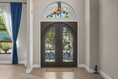 NOT IN A FLOOD ZONE! Metal roof, impact windows and sliders, new on Seminole Lakes Country Club in Florida - for sale on GolfHomes.com, golf home, golf lot