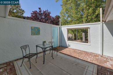 Step into this sophisticated level-in, single row and end unit on Rossmoor Golf Course in California - for sale on GolfHomes.com, golf home, golf lot