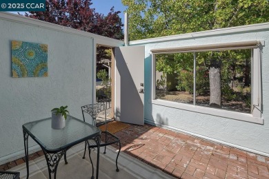 Step into this sophisticated level-in, single row and end unit on Rossmoor Golf Course in California - for sale on GolfHomes.com, golf home, golf lot